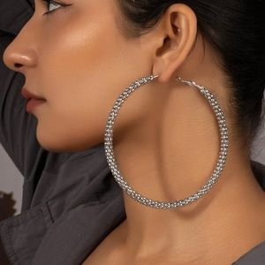 Super cute huge textured silver hoops.